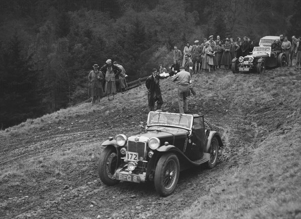 MG PA of D Clare competing in the MCC Edinburgh Trial, Roxburghshire, Scotland, 1938. Artist: Bill Brunell.