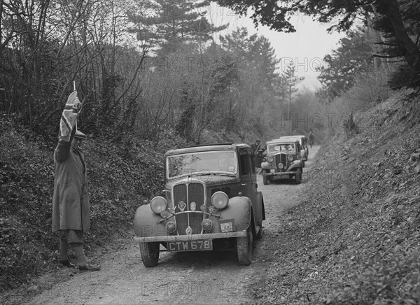 Two Standards competing in a Standard Car Club trial, late 1930s. Artist: Bill Brunell.