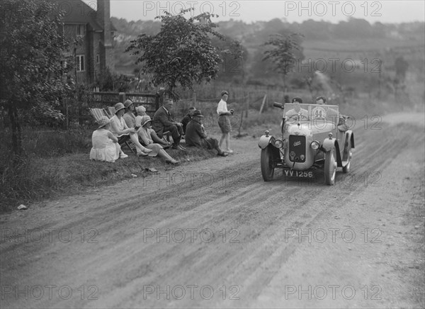 Austin Swallow of Mrs A Stanley competing in the Middlesex County AC Hill Climb, c1930. Artist: Bill Brunell.