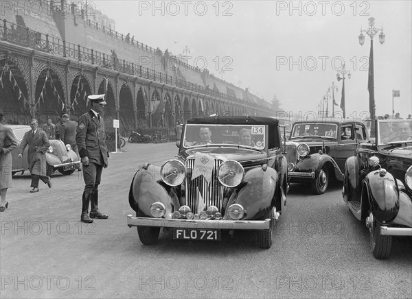 Jaguar SS of TH Bridgewater at the RAC Rally, Brighton, Sussex, 1939. Artist: Bill Brunell.