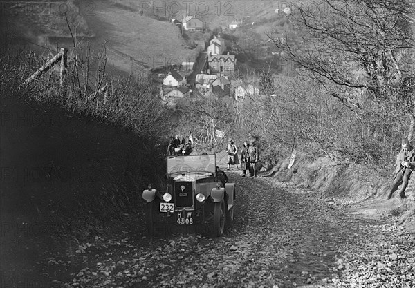 Singer Junior of RW Everard competing in the MCC Lands End Trial, Beggars Roost, Devon, 1929. Artist: Bill Brunell.