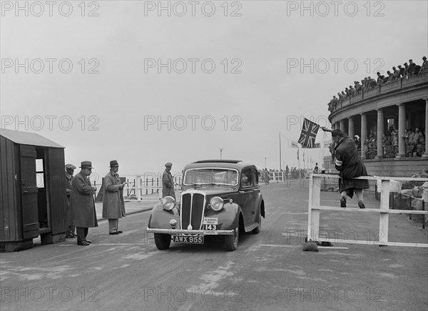 Standard Flying Sixteen of JR Bentley competing in the Blackpool Rally, 1936. Artist: Bill Brunell.