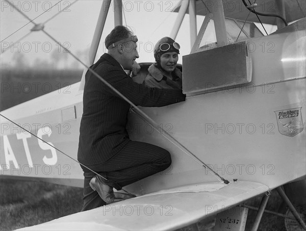 Kitty Brunell in the cockpit of a Blackburn Bluebird aeroplane, c1930s. Artist: Bill Brunell.