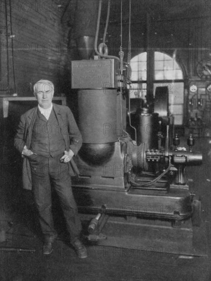 Thomas Alva Edison, American inventor, with his first dynamo for producing electric light, 1880s. Artist: Unknown