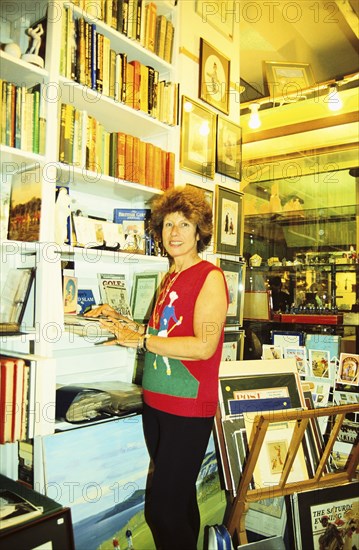 Author Sarah Fabian Baddiel at home with some of her golfing collection. Artist: Unknown