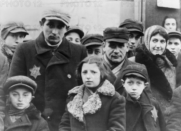 Jews wearing Star of David badges, Lodz Ghetto, Poland, 1940-1944. Artist: Unknown