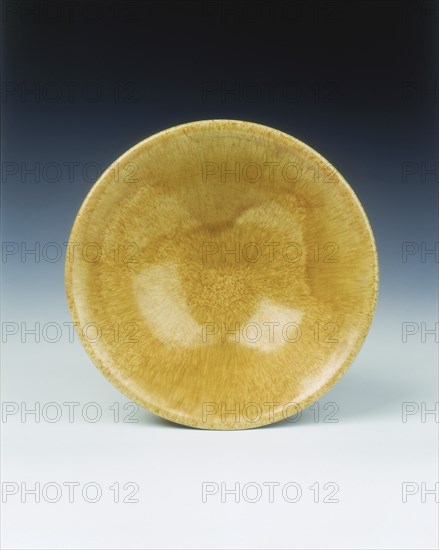 Yellow lead glazed bowl, late Tang dynasty, China, 9th century. Artist: Unknown