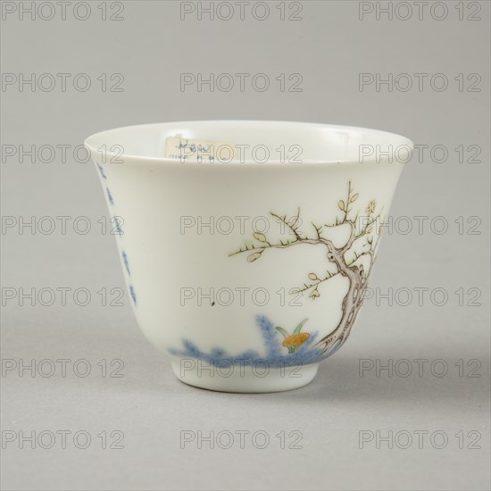 Underglaze blue month cup with polychrome enamelled decoration of a prunus tree. Artist: Unknown.