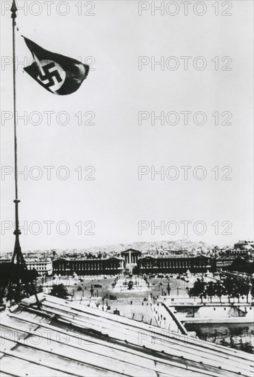 Nazi swastika flying over the occupied city of Paris, June 1940. Artist: Unknown