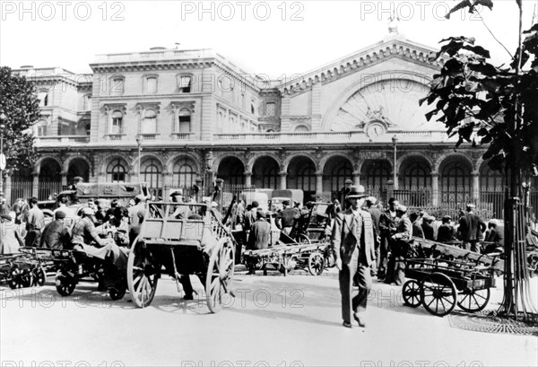 Outside the Gare de l'Est, German-occupied Paris, September 1940. Artist: Unknown