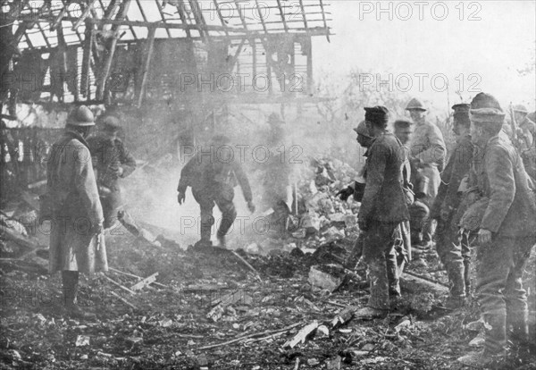 French troops using flamethrowers to flush out Germans from their shelters, Cantigny, France, 1918. Artist: Unknown