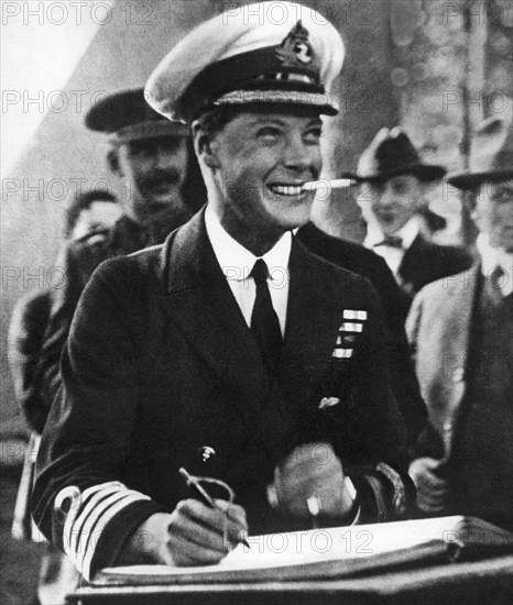 The Prince of Wales signing a visitors' book in Canada, c1920s. Artist: Unknown