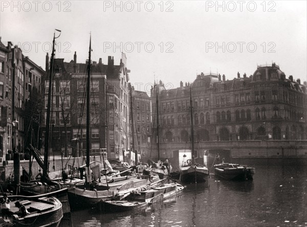 Canal boats, Rotterdam, 1898.Artist: James Batkin