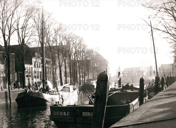 Canal boats, Dordrecht, Netherlands, 1898.Artist: James Batkin