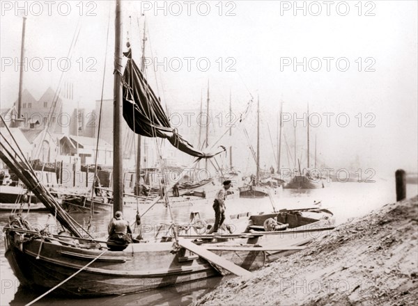 Canal boats, Rotterdam, 1898.Artist: James Batkin