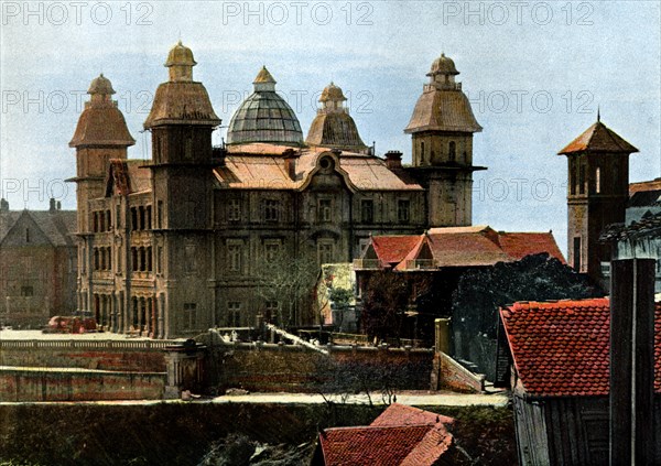 Palace of the ex-first minister, and the barracks of the marines, Madagascar, late 19th century.Artist: Gillot