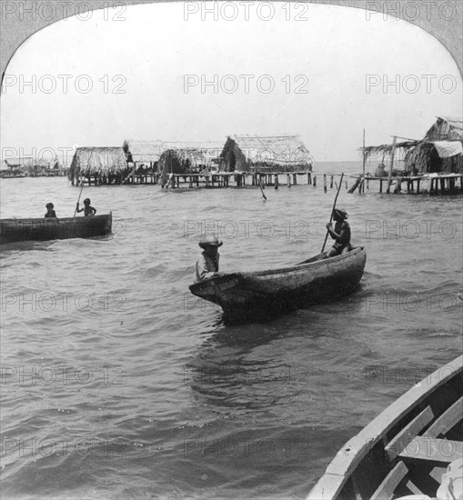 Indians in log canoes, Lake Maracaibo, Venezuela, c1900s. Artist: Unknown