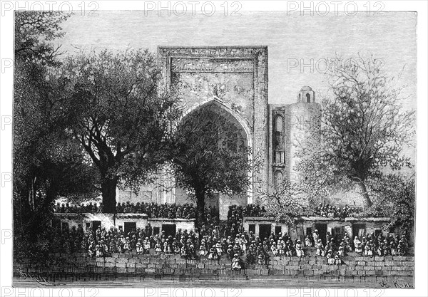 An assembly before the mosque in Bukhara, Uzbekistan, 1895.Artist: Armand Kohl