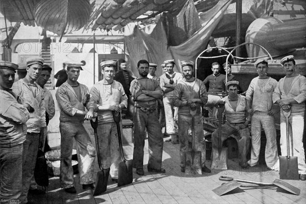 Some of the stokers of the battleship HMS 'Camperdown', 1896.Artist: Gregory & Co