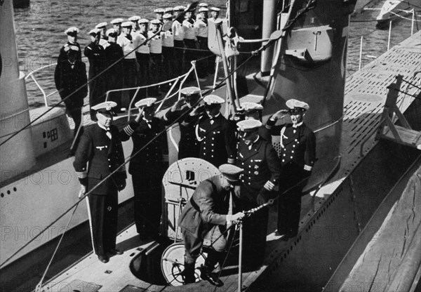 Adolf Hitler inspecting the first German U-boats at Kiel, Germany, August 1935. Artist: Unknown