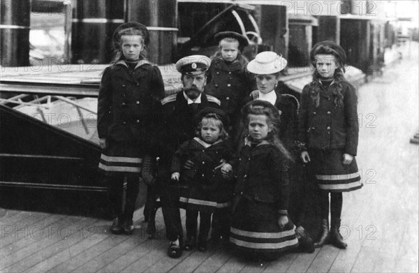 Tsar Nicholas II and Tsarina Alexandra of Russia and their children, 1907.  Artist: Unknown.