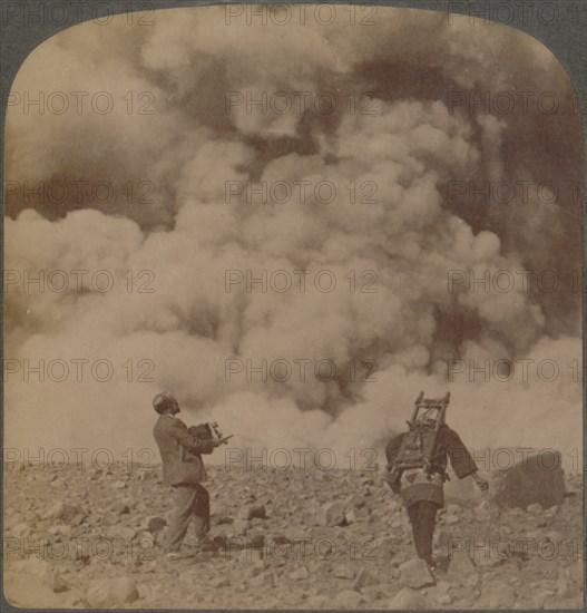 'Volcanic explosion - smoke, steam and stones thrown from crater of Asama-yama, Japan', 1904.  Artist: Unknown.