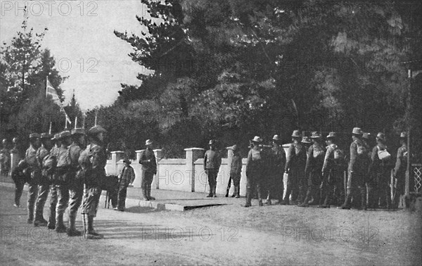 'Grenadier Guards (with their new hats) relieving guard at Lord Roberts's headquarters, Pretoria', 1 Artist: Unknown.