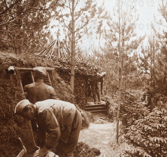 Soldiers in earth-covered shelters, Genicourt, northern France, c1914-c1918. Artist: Unknown.