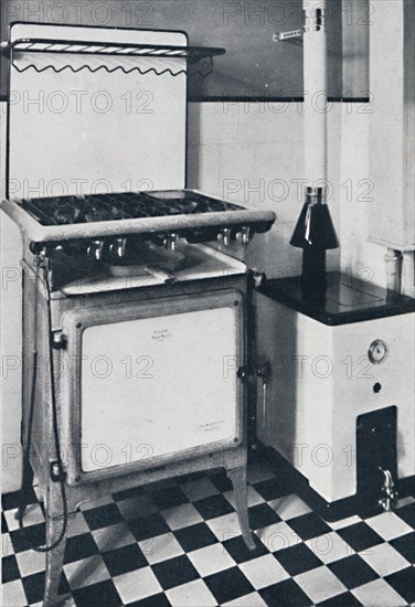 'Ideal Boilers & Radiators Ltd. - In black and white or grey mottled, this gas boiler is vitreous en Artist: Unknown.