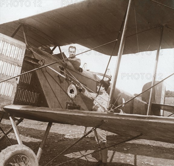 Pilot in biplane, c1914-c1918. Artist: Unknown.