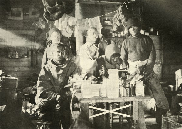 'Group in the Hut in the Summer: Joyce at the Sewing Machine', 1908, (1909).  Artist: Unknown.