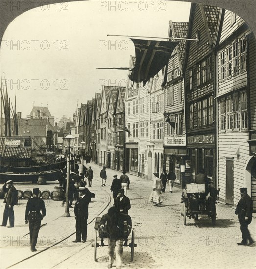 'Warehouses along the quay in  old town Bergen, for centuries the great fish mart of Norway', c1905. Creator: Unknown.