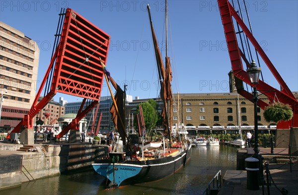 Barge passing through St Katherine's Lock, London