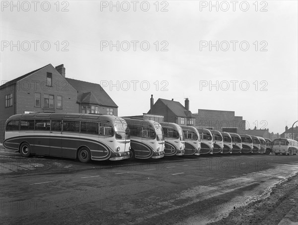 Fleet of Phillipson's coaches, Goldthorpe, South Yorkshire, 1963.  Artist: Michael Walters