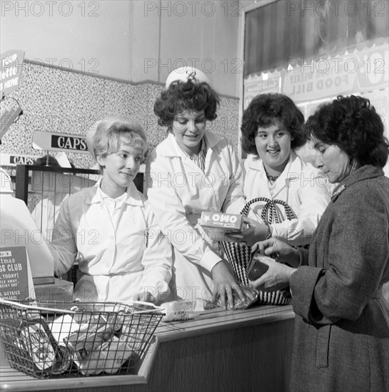 Checkout girls at a supermarket opening, Brough's Ltd, Thurnscoe, South Yorkshire, 1963. Artist: Michael Walters