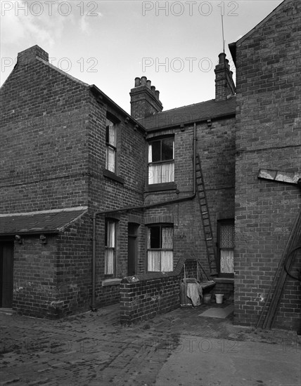 Typical pit housing in Furlong Road, Bolton upon Dearne, South Yorkshire, 1963.  Artist: Michael Walters
