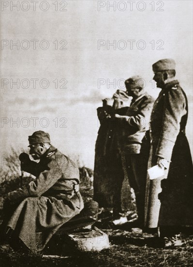 King Peter I of Serbia watching the retreat of his defeated army, 1914. Artist: Unknown