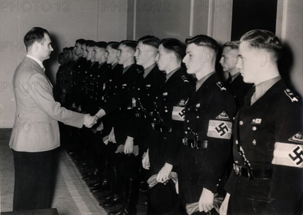 Nazi Deputy Führer Rudolf Hess meeting members of the Hitler Youth, Germany, January 1939. Artist: Unknown