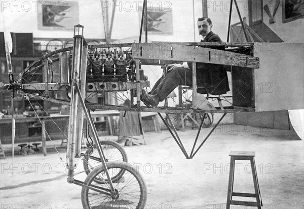 Louis Blériot sitting in his monopolane, c. 1920.