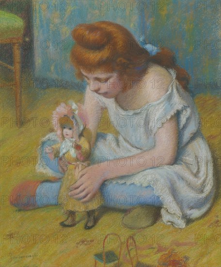 Yung girl playing with a doll.