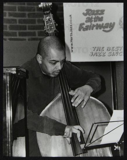 Double bassist Gary Crosby playing at The Fairway, Welwyn Garden City, Hertfordshire, 2004. Artist: Denis Williams