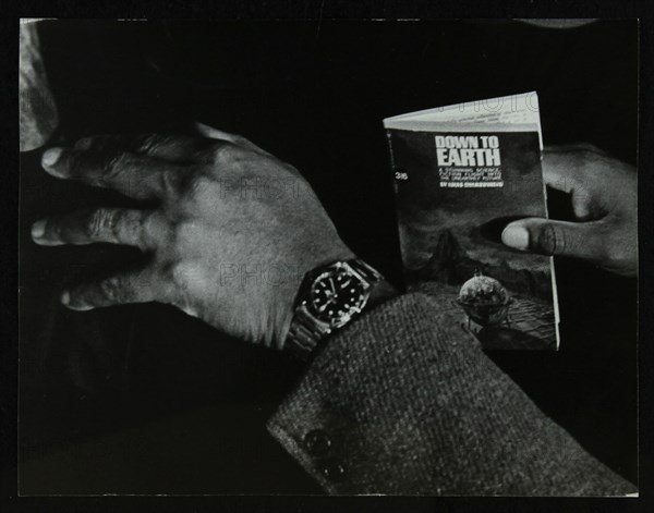 The hands and book of American double bassist Eddie Jones, Welwyn Garden City, Hertfordshire, 1967. Artist: Denis Williams