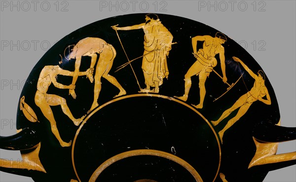 Attic red-figure cup depicting trainer with wrestlers and other athletes, 480 BC. Artist: Antiphon Painter.