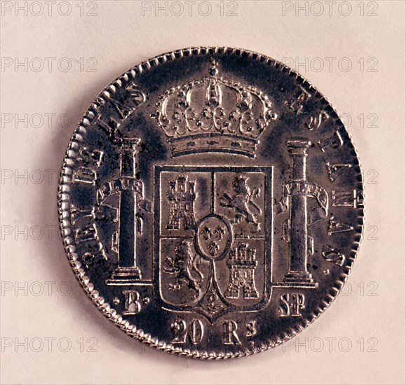 Back of a coin of 20-reales in silver, Ferdinand VII. Mint: Barcelona, 1823.