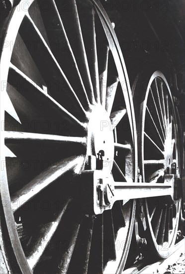 Axle wheels of a steam train engine.