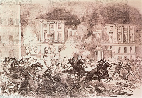 Civil disturbances in Madrid, the insurgents try to burn the palace of Queen Maria Cristina, 1854.