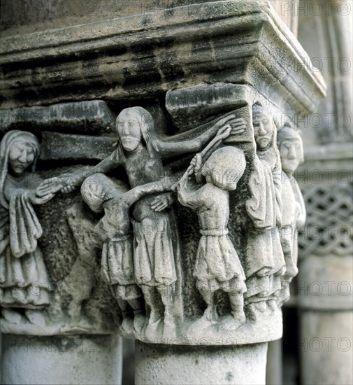 Detail of a capital in the cloister of the collegiate.