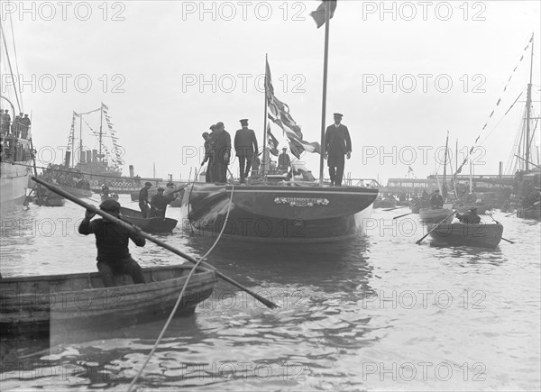 The launch of 'Shamrock IV' at Gosport, May 1914. Creator: Kirk & Sons of Cowes.