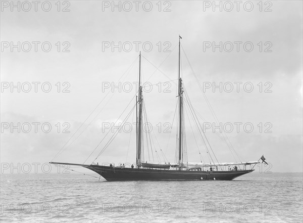 The schooner 'Allah Karim' at anchor, 1912. Creator: Kirk & Sons of Cowes.