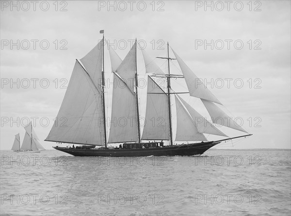 The auxiliary schooner 'La Cigale' sailing close-hauled, 1913. Creator: Kirk & Sons of Cowes.